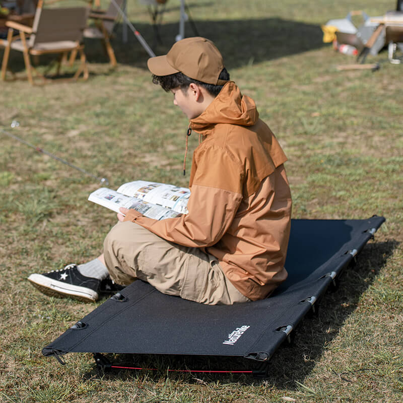 Lit de camp pliant pour l'extérieur