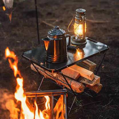 Table avec support pour bois de chauffage