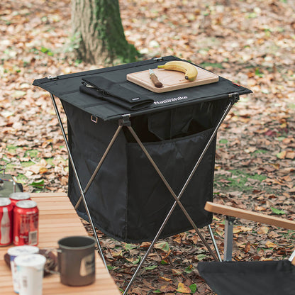 Table pliante avec boîte de rangement à surface souple